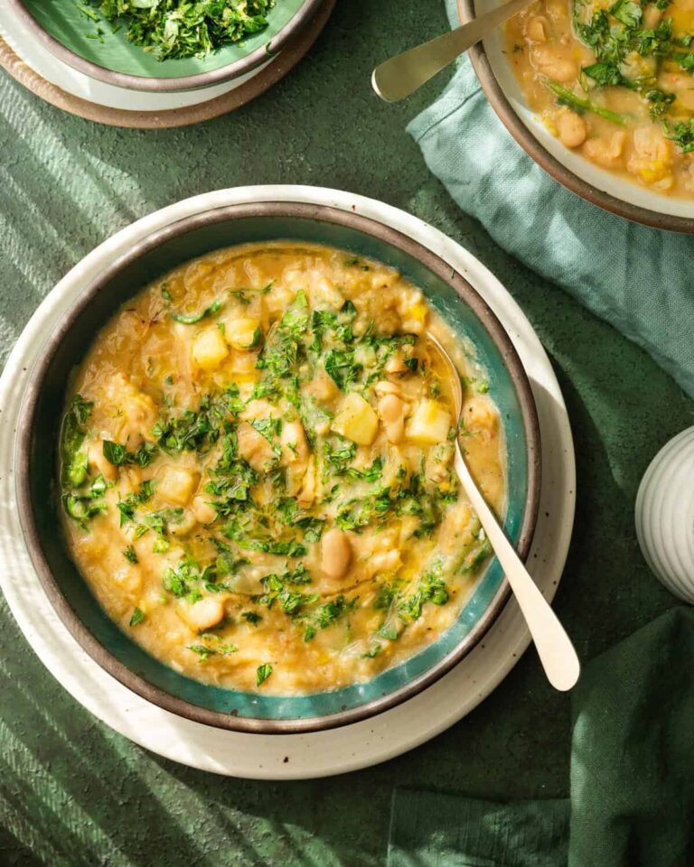 Leek-based soup with greens served in a bowl