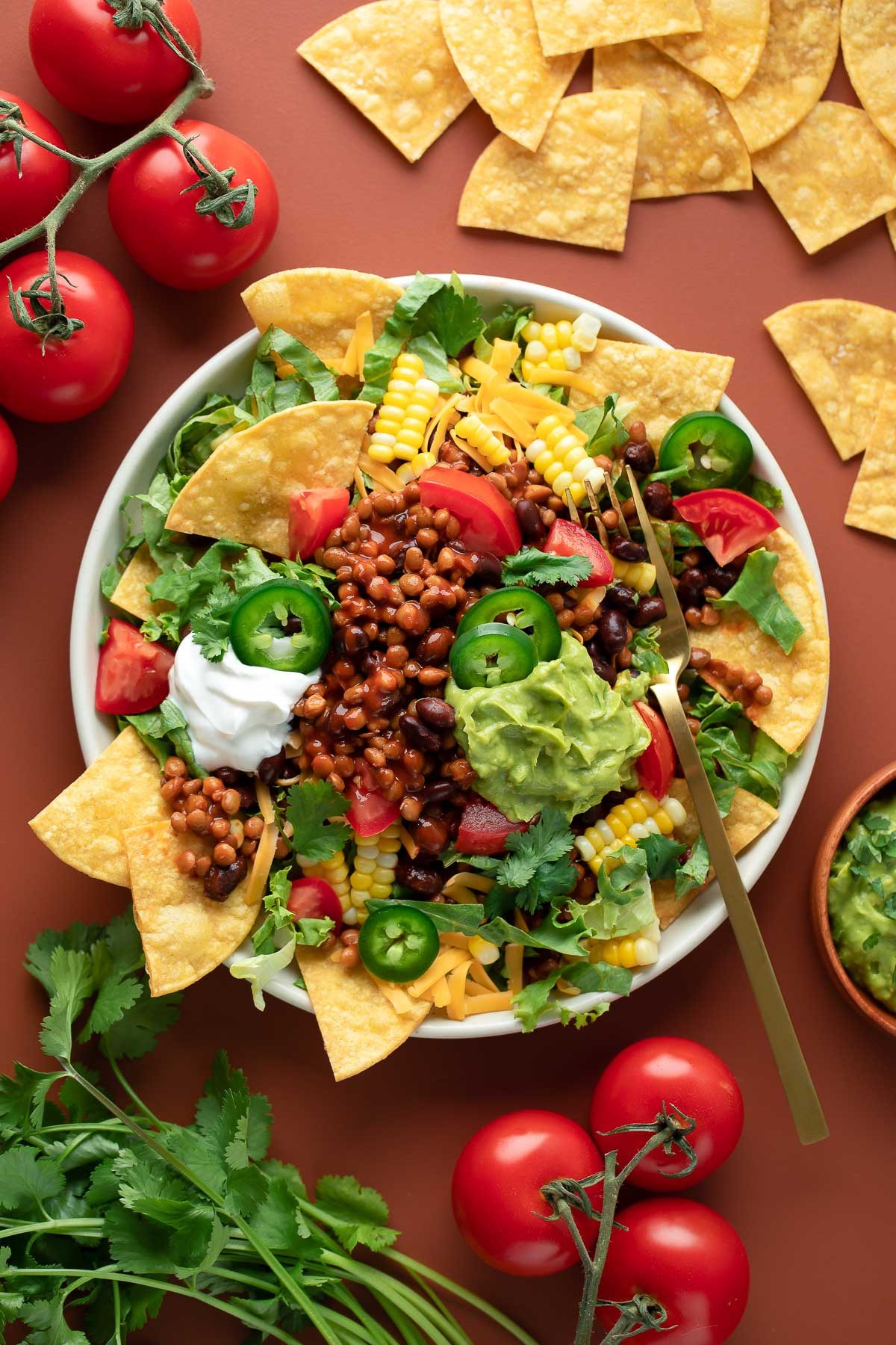 Vegan sweet potatoes filled with creamy spiced lentils and spinach