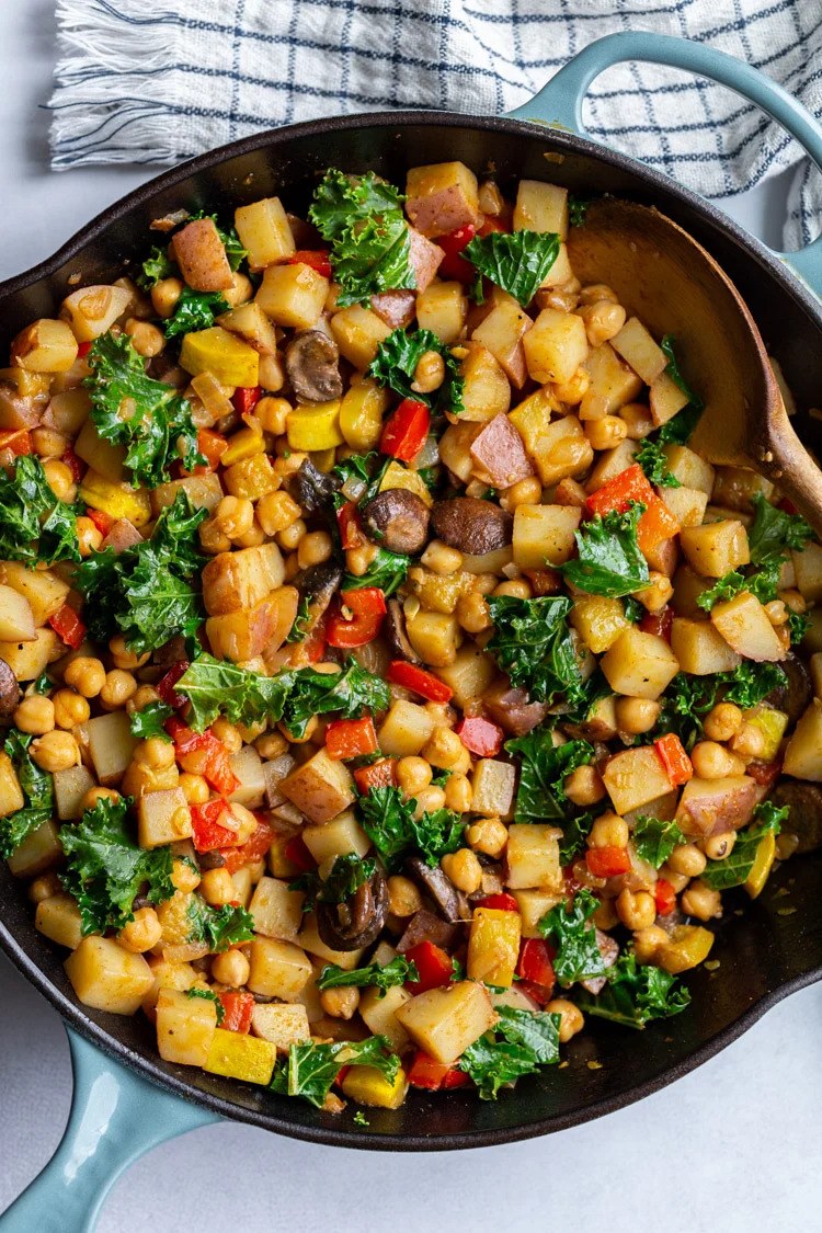 Crispy potato and chickpea hash with bell peppers and avocado