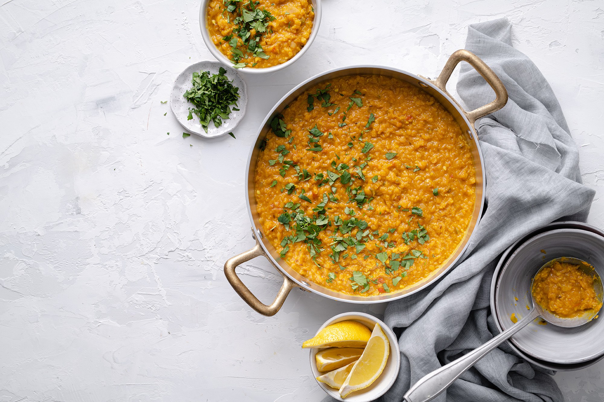 Coconut-finished red lentil dal with herbs