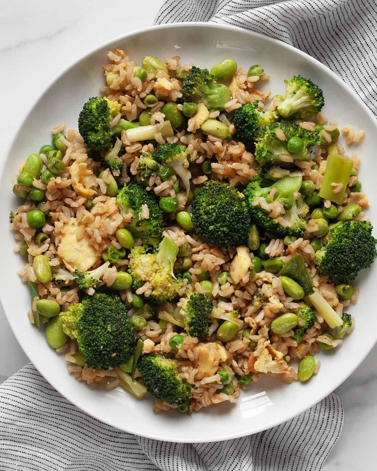 Rice bowl with tofu, edamame, broccoli and peanut sauce