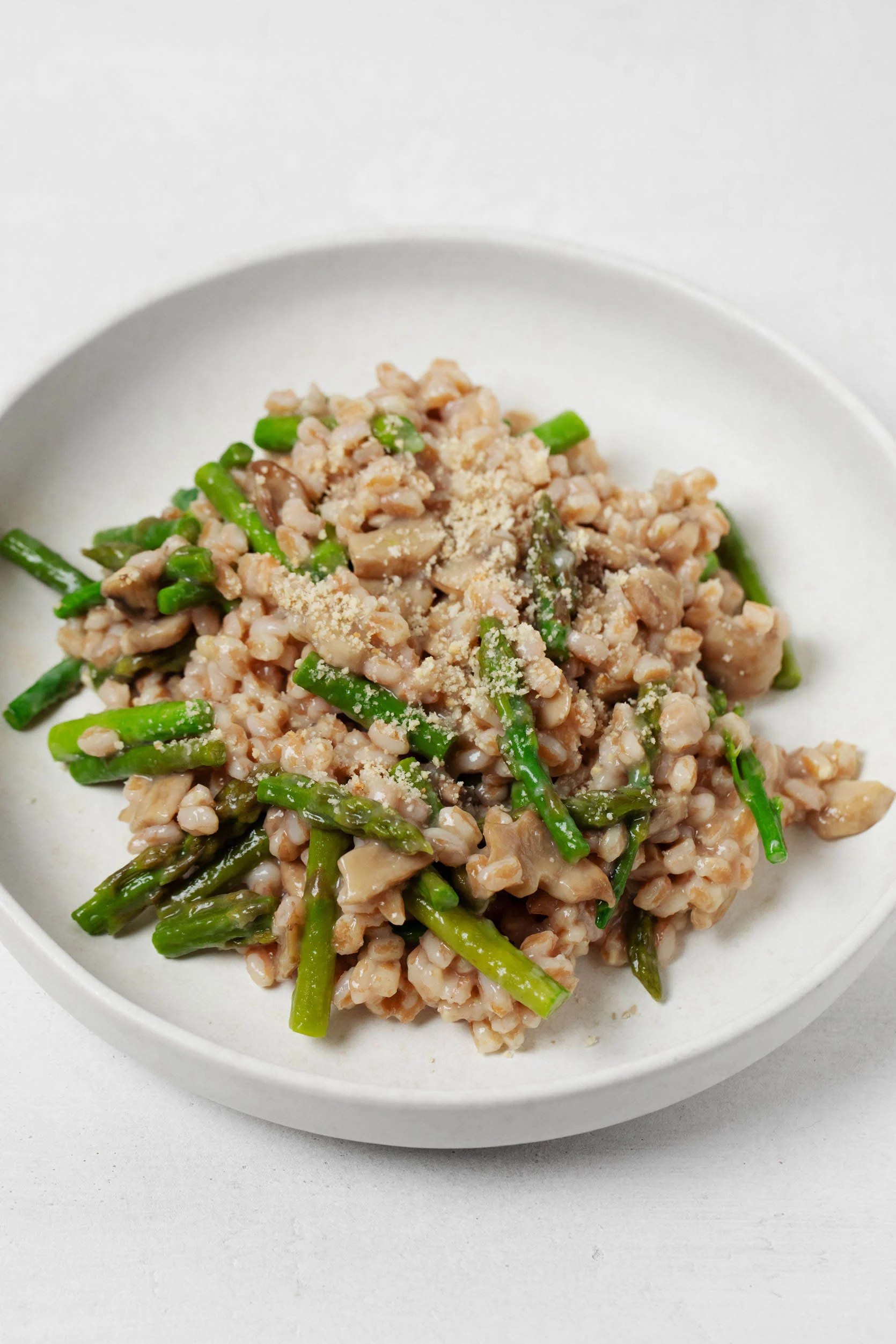 Creamy pearl barley risotto with oyster mushrooms, peas and herbs